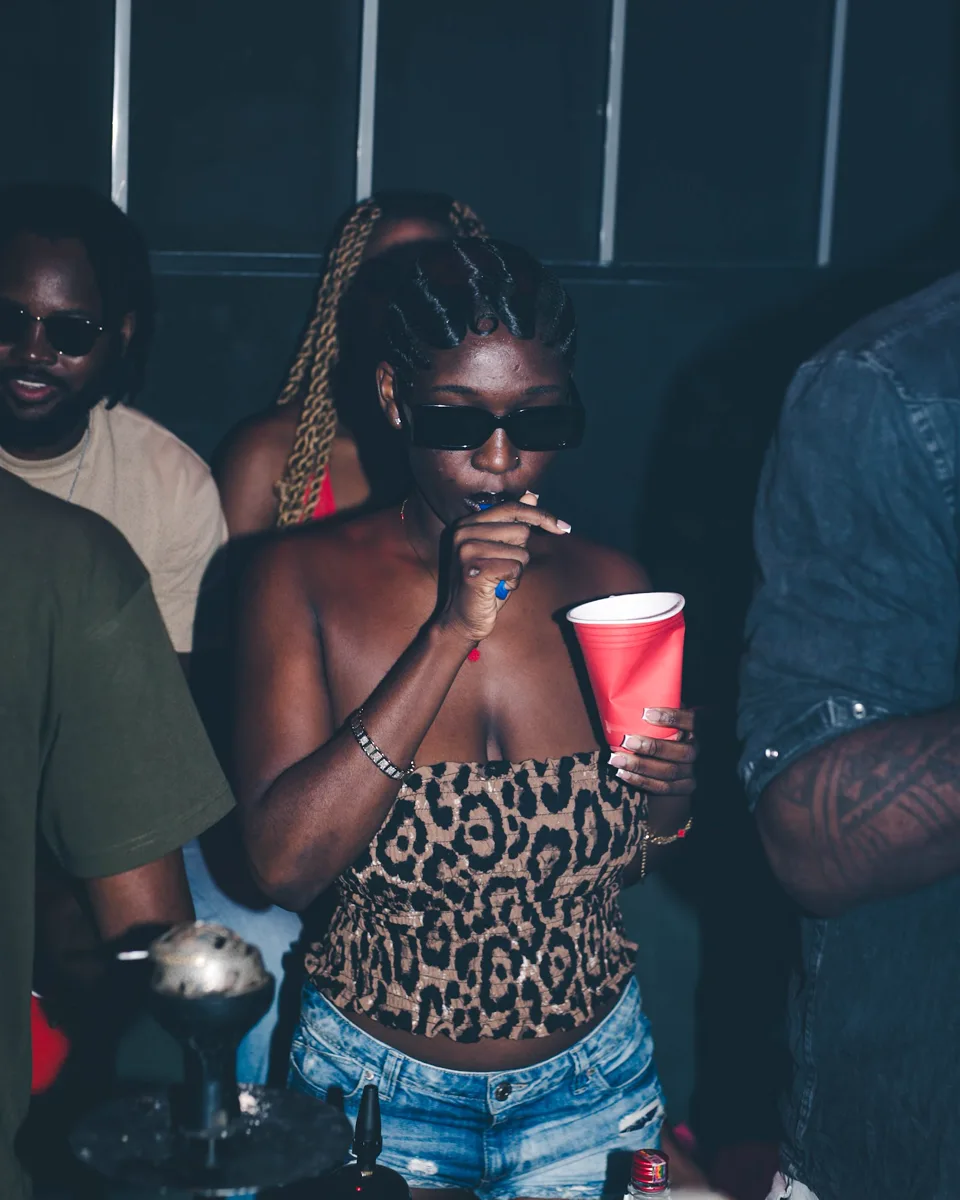 G+ guests on a night out, with distressed blue denim shorts in the foreground